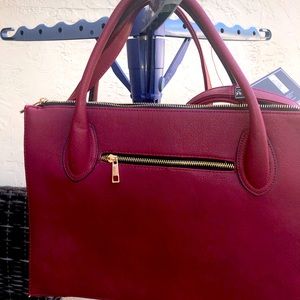 Never used, mint condition Merlot tote handbag. Perfect holiday gift
